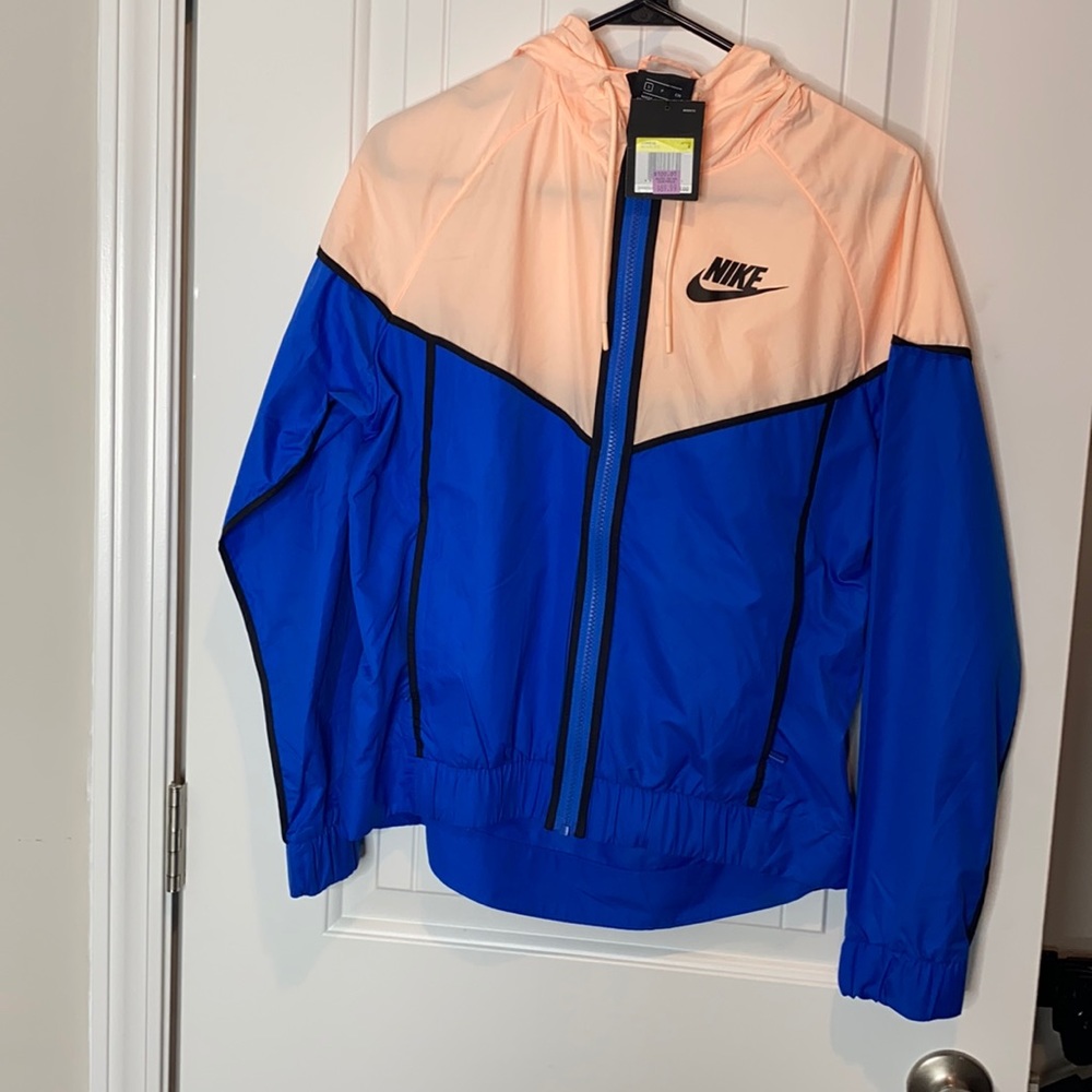 Nike women’s track jacket size small light weight blue n salmon color